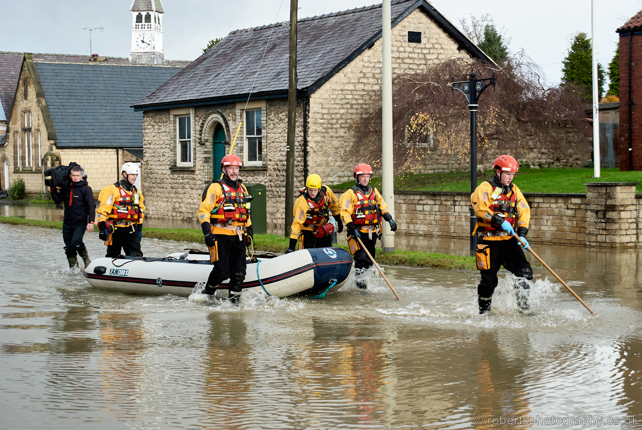 Malton Fire & Rescue are pictured rescuing people using an inflatable dingy