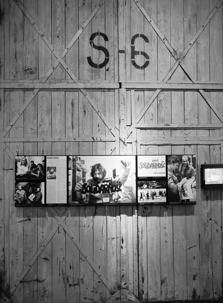 The original shipyard gates displayed inside Solidarnosc Museum.