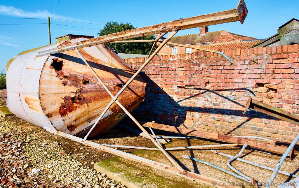 A rusty old feed bin on a pig farm.