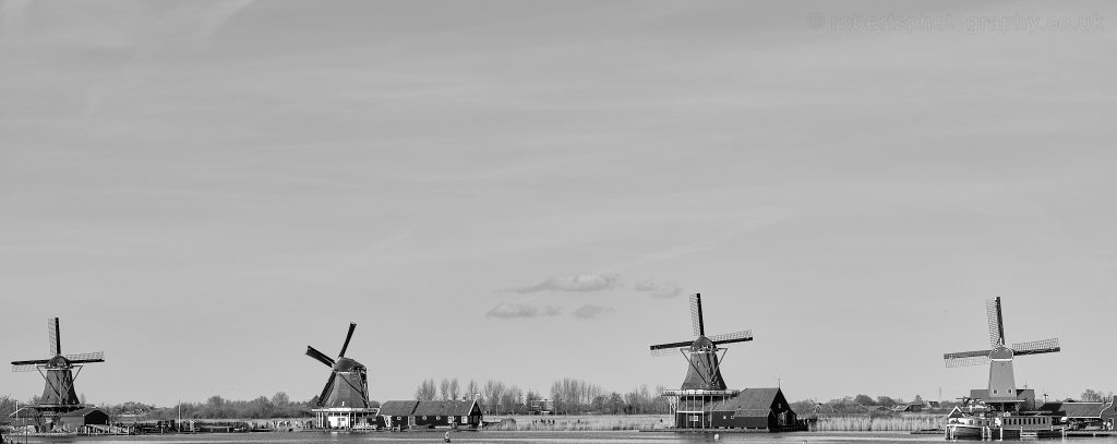 Zaanse Schans: Famous for its collection of working windmills.